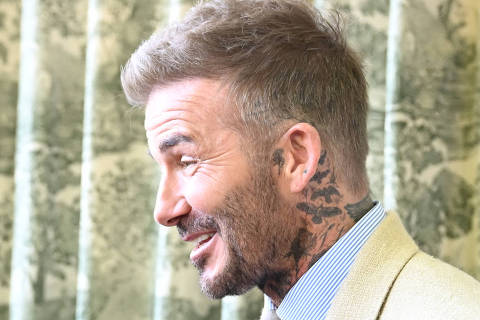 Britain's King Charles, patron of the Royal Horticultural Society speaks with businessman and retired football player David Beckham as they visit the RHS Chelsea Flower Show in London, Britain, May 19, 2025. Paul Grover/Pool via REUTERS ORG XMIT: POOL