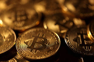FILE PHOTO: Illustration shows representations of cryptocurrency Bitcoin