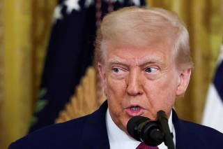 FILE PHOTO: U.S. President Trump signs a resolution at the White House