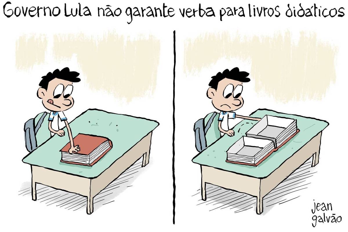 Charge de Jean Galvão com o título “ Governo Lula não garante verba para livros didáticos” é dividida em duas cenas, lado a lado, separadas por uma linha vertical. Na cena da esquerda, um menino com camiseta branca de escola pública e mochila azul está de pé diante de uma mesa. Sobre a mesa há um grande livro didático vermelho. O menino olha para ele com interesse e estica a mão para pegá-lo.Na cena da direita, ele abre o livro, que está completamente oco por dentro, como uma caixa vazia. Não há nenhuma folha, apenas as capas e o miolo em branco, como molduras ocas.