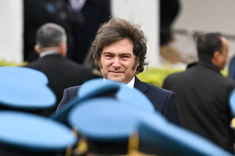 Argentina's President Javier Milei arrives to address the media during a press conference at the Federal Police Mounted Division, in Buenos Aires, Argentina, June 17, 2025. REUTERS/Martin Cossarini ORG XMIT: LIVE