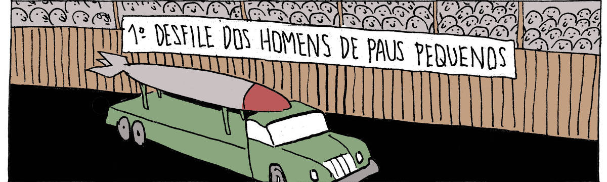 A tira de André Dahmer, publicada em 19.06.2025, tem apenas um quadro. Nele, um caminhão militar carrega um enorme míssil diante de uma plateia. Há uma faixa pendurada, onde se lê "Primeiro desfile de homens de paus pequenos".