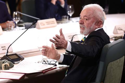 Brazilian President Luiz Inacio Lula da Silva gestures while taking part in a working lunch with the theme, 'Energy Security,' during the Group of Seven (G7) Summit at the Kananaskis Country Golf Course in Kananaskis, Alberta, Canada on June 17, 2025. (Photo by Teresa SUAREZ / POOL / AFP) ORG XMIT: CJX70