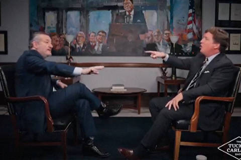 Conservative podcast host and commentator Tucker Carlson engages in an exchange with U.S. Senator Ted Cruz of Texas on the subject of the United States' involvement in the conflict between Israel and Iran, in a still image from video released June 17, 2025.  Tucker Carlson Network/Handout via REUTERS        NO RESALES. NO ARCHIVES. THIS IMAGE HAS BEEN SUPPLIED BY A THIRD PARTY MANDATORY CREDIT ORG XMIT: VAN110