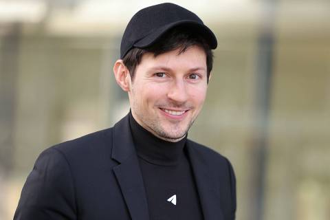 (FILES) Pavel Durov, CEO and co-founder of Telegram messaging app, arrives at the Paris courthouse for a hearing, in Paris on December 6, 2024. Pavel Durov arrested in France in August 2024, charged with publishing illegal content on the application, has left France with authorities' permission, AFP learnt on March 15, 2025. (Photo by Thomas SAMSON / AFP)