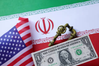Illustration shows model of natural gas pipeline, U.S. and Iran flags and Dollar banknotes