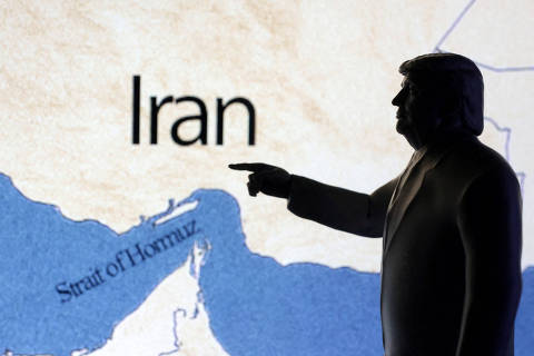 A map showing the Strait of Hormuz and Iran is seen behind a 3D printed miniature of U.S. President Donald Trump in this illustration taken June 22, 2025. REUTERS/Dado Ruvic/Illustration ORG XMIT: PPP-DAD005
