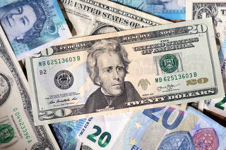 Illustration shows U.S. dollar, Euro and Pound banknotes