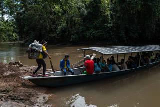 A growing fleet of electric boats ferries Indigenous people through the heart of the Ecuadorean Amazon, providing a cheaper and greener alternative to gas-powered vessels. (Federico Rios Escobar/The New York Times)