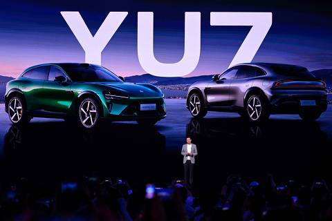 Lei Jun, Chairman and CEO of Chinese electronics company Xiaomi, introduces the Xiaomi  YU7 car, during a launching event in Beijing on June 26, 2025. (Photo by WANG Zhao / AFP)