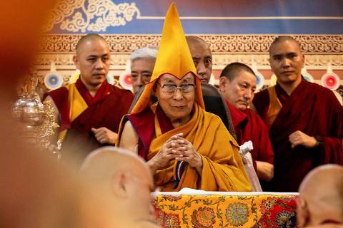 Tibetan spiritual leader the Dalai Lama (C) attends a Long Life Prayer offering ceremony at the Main Tibetan Temple in McLeod Ganj, near Dharamsala on June 30, 2025. Exiled Tibetan spiritual leader, the Dalai Lama, gave on June 30, the strongest indication yet that the 600-year-old institution would continue after his death, at prayer celebrations for his 90th birthday. The leader, who turns 90 on July 6, is according to Tibetans the 14th reincarnation of the Dalai Lama. (Photo by Sanjay BAID / AFP)