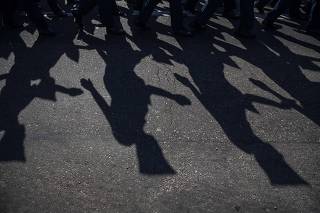 Criança com simulacro de arma no evento da Revolução Constitucionalista de 1932