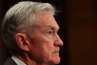 FILE PHOTO: Federal Reserve Chair Powell testifies on monetary policy to the Senate Banking Committee in Washington
