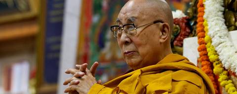 Tibetan spiritual leader the Dalai Lama attends a long-life prayer ceremony at Tsuglakhang Temple in Mcleodganj, Dharamshala on July 5, 2025. The Dalai Lama said on July 5 he dreamed of living for decades more, as the Buddhist spiritual leader prayed with thousands of exiled Tibetans on the eve of his 90th birthday. (Photo by Niharika KULKARNI / AFP)