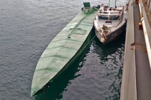A handout photo released by the Mexican Navy and Secretary for National Defence shows a clandestine semi-submersible vessel that was intercepted off the Pacific coast of the southern state of Guerrero, Mexico, on June 27, 2025. Mexican navy officials seized 3.5 tonnes of cocaine hidden in a semi-submersible vessel off the Pacific coast, authorities said. (Photo by Handout / Mexican Navy / AFP) / RESTRICTED TO EDITORIAL USE - MANDATORY CREDIT 