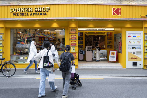 People outside Corner Shop, a Kodak Apparel store in Seoul, May 29, 2025. Kodak Apparel is the brainchild of Lee Jun Kwon, the chief executive of Hilight Brands, a South Korean fashion company that has been acquiring licenses to prominent trademarks. (Woohae Cho/The New York Times) ORG XMIT: XNYT0323