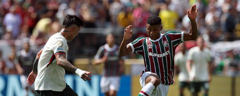 Soccer Football - FIFA Club World Cup - Semi Final - Fluminense v Chelsea - MetLife Stadium, East Rutherford, New Jersey, U.S. - July 8, 2025 Fluminense's Hercules in action with Chelsea's Enzo Fernandez REUTERS/Amanda Perobelli