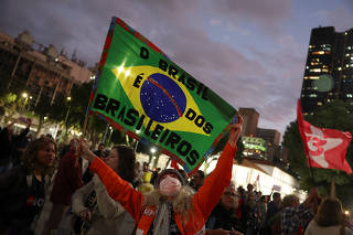 Demonstrators take part in a protest against U.S. President Donald Trump?s announcement of 50% tariffs on Brazilian products, in Rio de Janeiro