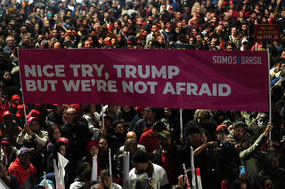 Demonstrators take part in a protest against U.S. President Donald Trump?s announcement of 50% tariffs on Brazilian products, in Sao Paulo