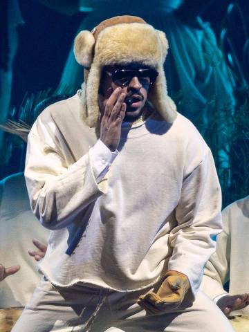 Puerto Rican singer Bad Bunny performs onstage during the first show of his 30-date concert residency at the Coliseo de Puerto Rico in San Juan, Puerto Rico, on July 11, 2025. (Photo by Ricardo ARDUENGO / AFP)