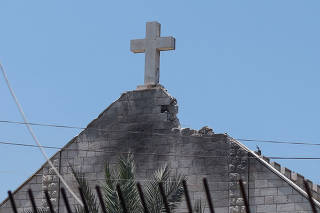 A view shows the damage at the Holy Family Church which was hit in an Israeli strike on Thursday, in Gaza City