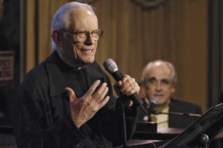 Alan Bergman, left, and Michel Legrand perform at Feinstein's at the Regency, in New York.