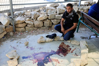 Aftermath of a clash with an Israeli settler at the village of Umm al-Khair near the West Bank city of Hebron