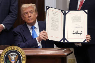 U.S. President Trump signs the VA Home Loan Program Reform Act at the White House in Washington, D.C.
