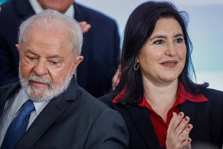 Brazil's President Luiz Inacio Lula da Silva and Brazil's Planning and Budget Minister, Simone Tebet attend a ceremony at the Planalto Palace in Brasilia