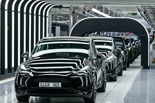 FILE PHOTO: Tesla Model Y cars are shown in a factory in Germany