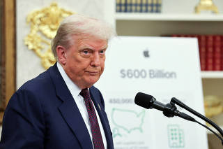 U.S. President Trump and Apple CEO Cook announce Apple's $100 billion investment in U.S. manufacturing, at the White House