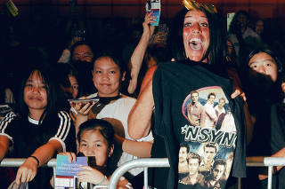 Fans wait for Joey Fatone, the former �N Sync singer, after a performance of �& Juliet� at the Stephen Sondheim Theater in New York, July 30, 2025. (Amir Hamja/The New York Times)