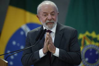 LULA E HUGO MOTTA EM EVENTO