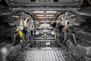 FILE PHOTO: EV production line at a Volkswagen Anhui factory in Hefei, China