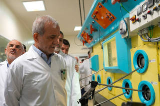 Iranian President Masoud Pezeshkian visits the Iranian Atomic Energy Organisation in Tehran