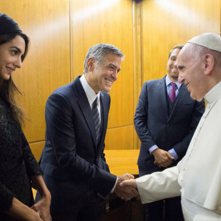 Pope Francis meets US actor Clooney and his wife Amal during a meeting of the Scholas Occurrentes at the Vatican